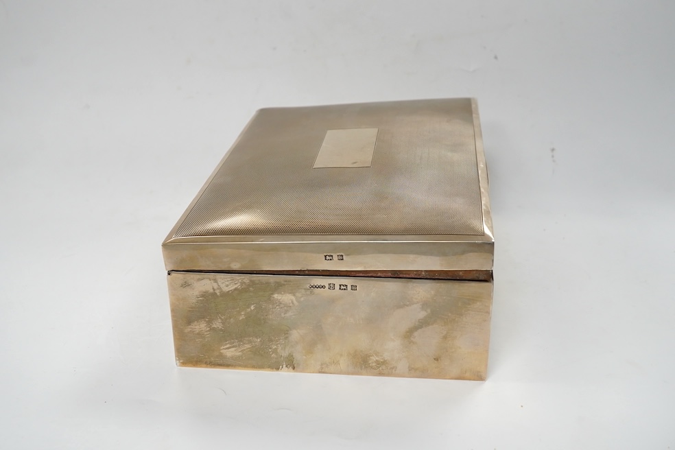 A 1970's silver mounted cigar/cigarette box, Birmingham, 1973, 22.9cm. Condition - poor